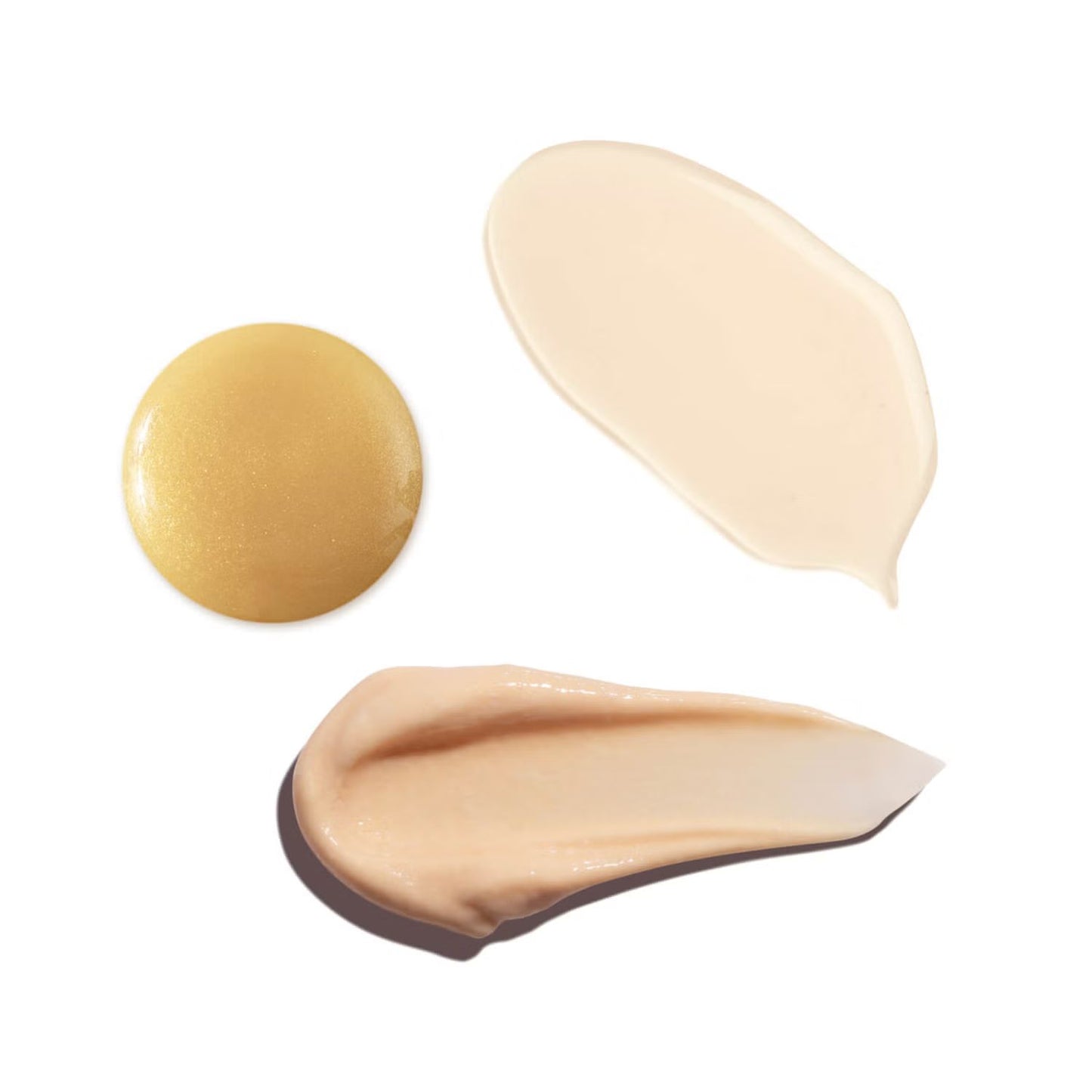 Cosmetic swatches in beige, yellow and brown